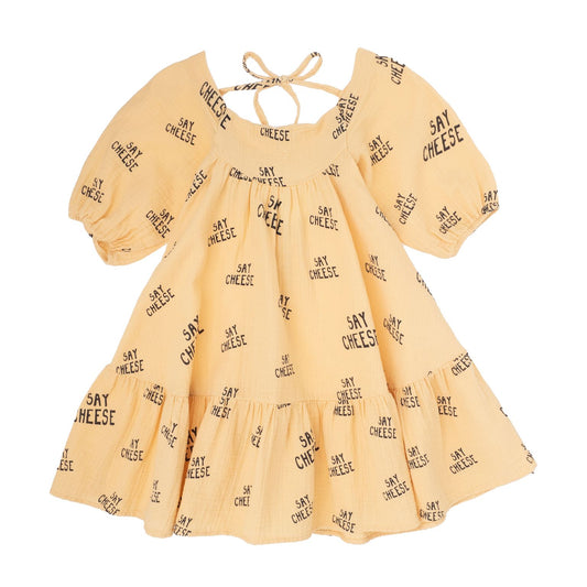 jurk geel say cheese Tocoto vintage 100% organisch katoen fairtrade gemaakt babykleding duurzame kinderkleding sustainable kids clothing